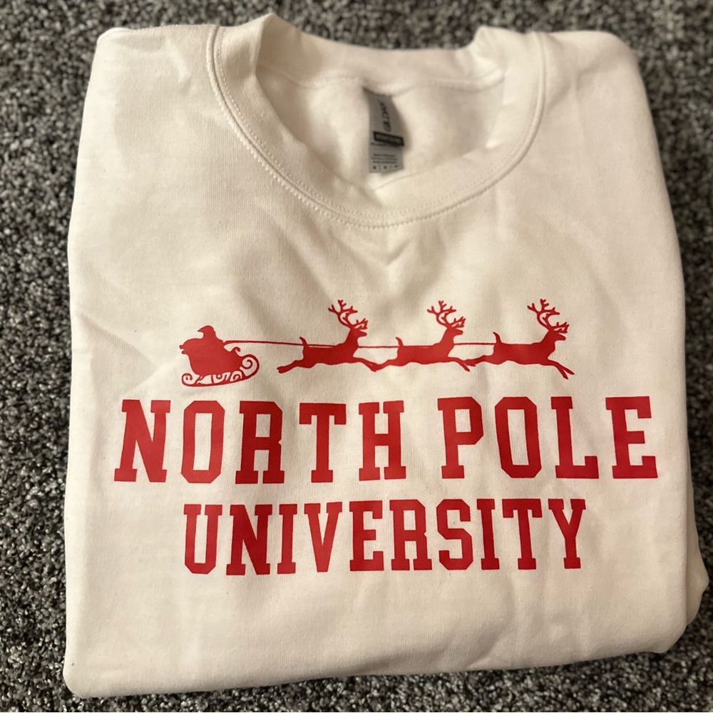 North Pole University Christmas Crewneck white with red writing